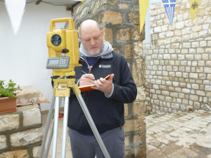 Courtesy Photo. Dean Philip Reeder collects survey data using a Total ...